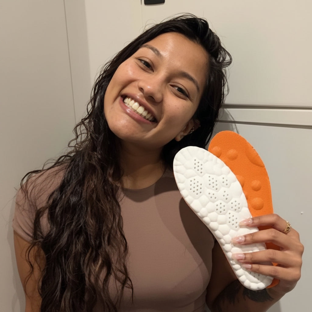 Close-up of unisex foot pads designed for massage and pain relief, highlighting textured surface & comfort