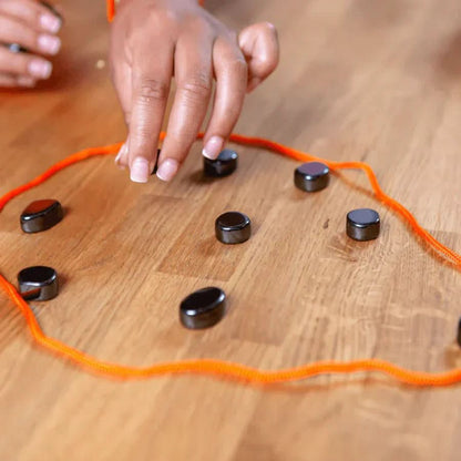 Magnetic Chess Set with Foldable Board and Piece Grip System