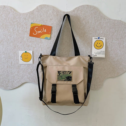 Convertible Shoulder Bag with Adjustable Strap and Multiple Compartments