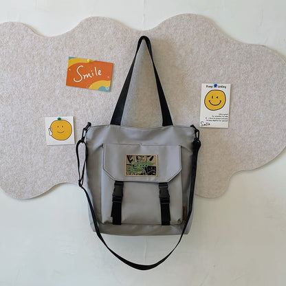 Convertible Shoulder Bag with Adjustable Strap and Multiple Compartments