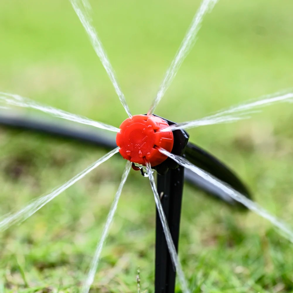 Drip Irrigation Timer System with Drip Heads and Adjustable Flow Levels
